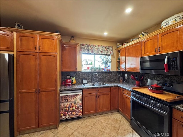 531 N Rossmore Ave Unit 202, Los Angeles, CA 90004 - kitchen featuring black electric range, dishwasher, freestanding refrigerator, decorative backsplash, and brown cabinets