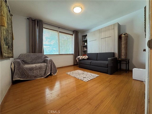 531 N Rossmore Ave Unit 202, Los Angeles, CA 90004 - living area featuring light wood-style floors