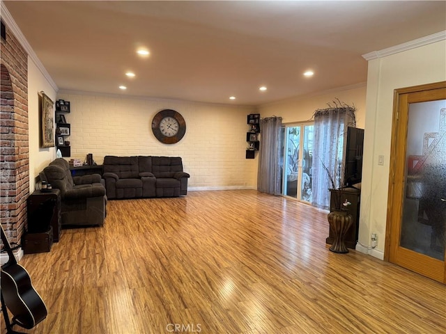 531 N Rossmore Ave Unit 202, Los Angeles, CA 90004 - living area featuring ornamental molding, wood finished floors, brick wall, and recessed lighting