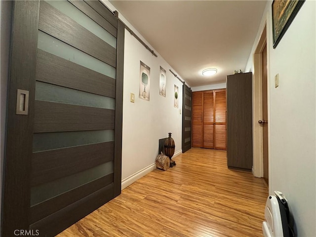 531 N Rossmore Ave Unit 202, Los Angeles, CA 90004 - corridor featuring wood finished floors and baseboards
