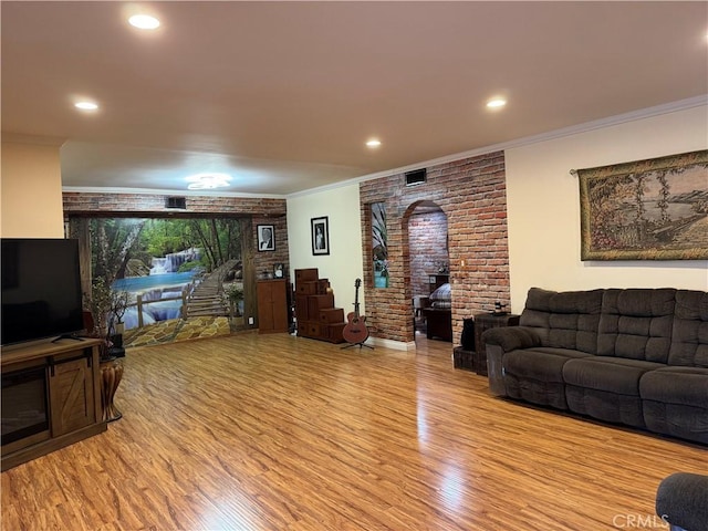 531 N Rossmore Ave Unit 202, Los Angeles, CA 90004 - living room featuring light wood finished floors, ornamental molding, and recessed lighting