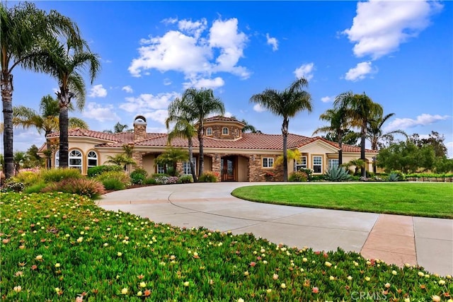 36090 Monte De Oro Rd, Temecula, CA 92592 - mediterranean / spanish home with a tile roof, a front lawn, stone siding, stucco siding, and a chimney