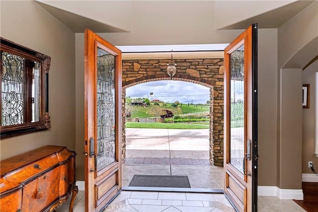 36090 Monte De Oro Rd, Temecula, CA 92592 - foyer entrance featuring plenty of natural light and arched walkways