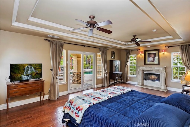 36090 Monte De Oro Rd, Temecula, CA 92592 - bedroom with a raised ceiling, access to outside, hardwood / wood-style floors, crown molding, and a high end fireplace