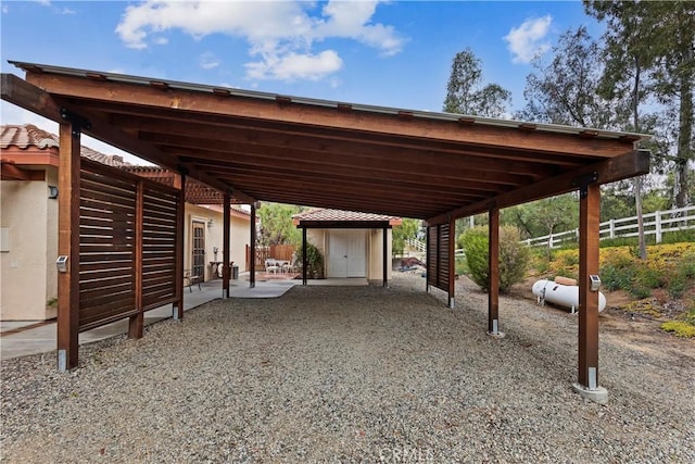 36090 Monte De Oro Rd, Temecula, CA 92592 - view of parking / parking lot with a shed and a carport