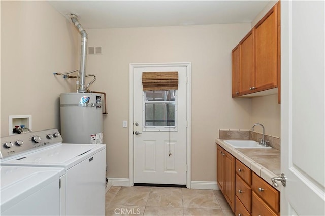 36090 Monte De Oro Rd, Temecula, CA 92592 - laundry room featuring water heater, cabinet space, separate washer and dryer, and light tile patterned floors