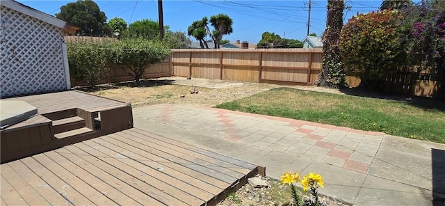 509 N 3rd St, Lompoc, CA 93436 - fenced backyard with a deck and a patio area
