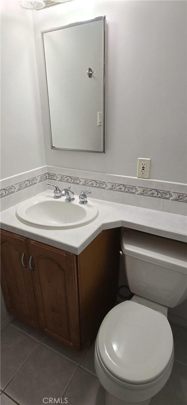 509 N 3rd St, Lompoc, CA 93436 - bathroom with vanity and tile patterned flooring