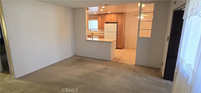 509 N 3rd St, Lompoc, CA 93436 - unfurnished living room with a ceiling fan and light colored carpet