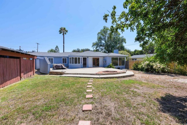 8802 Tyler St, Spring Valley, CA 91977 - rear view of property featuring a patio and a fire pit