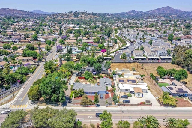 8802 Tyler St, Spring Valley, CA 91977 - aerial view of property and surrounding area featuring a mountainous background and nearby suburban area