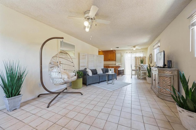 8802 Tyler St, Spring Valley, CA 91977 - living area with a textured ceiling, ceiling fan, and light tile patterned floors