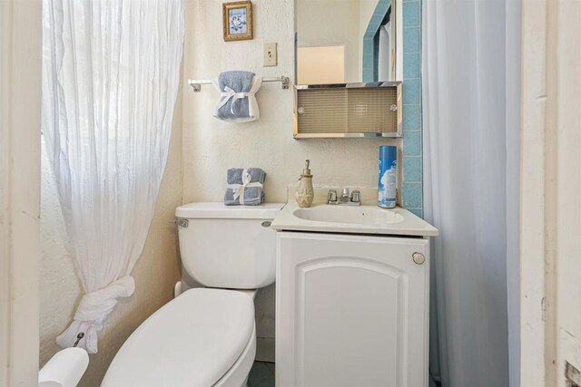 8802 Tyler St, Spring Valley, CA 91977 - bathroom featuring vanity and a textured wall