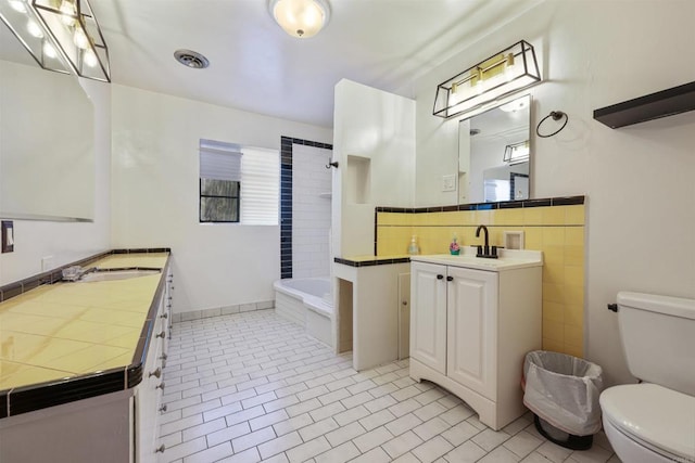 8802 Tyler St, Spring Valley, CA 91977 - full bath featuring vanity, tile patterned floors, tub / shower combination, and tile walls