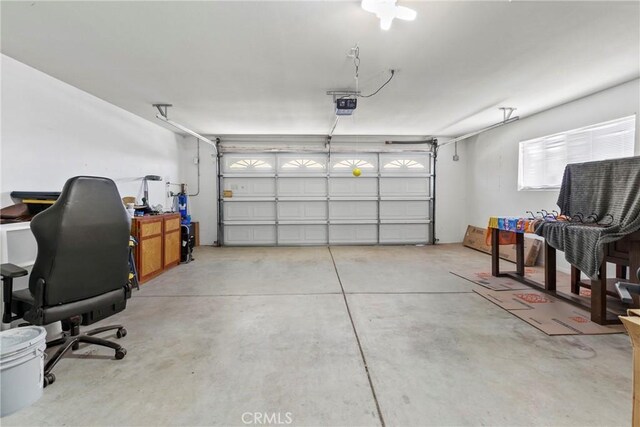 662 January St, Nipomo, CA 93444 - garage with a garage door opener and an office area