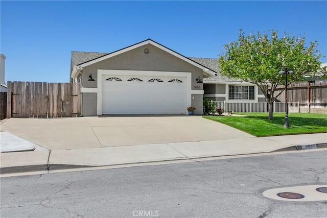 662 January St, Nipomo, CA 93444 - single story home with stucco siding, driveway, and a garage