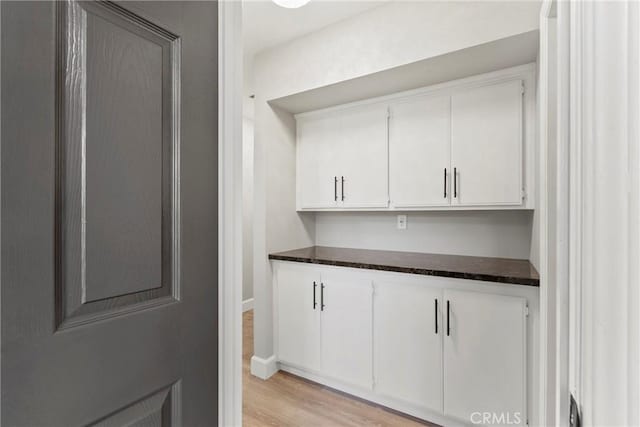 662 January St, Nipomo, CA 93444 - bar area featuring light wood-style flooring and baseboards