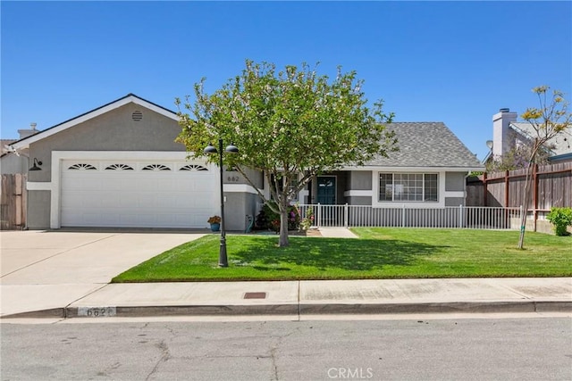 662 January St, Nipomo, CA 93444 - view of front facade featuring a garage, driveway, and stucco siding