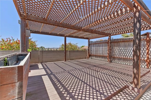 662 January St, Nipomo, CA 93444 - wooden deck with a fenced backyard, a pergola, and a patio area