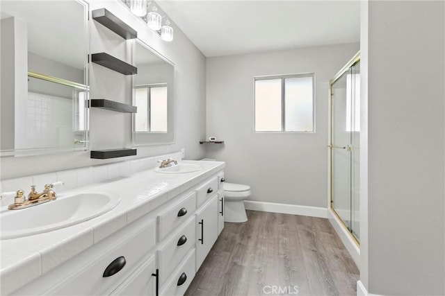 662 January St, Nipomo, CA 93444 - bathroom featuring healthy amount of natural light, double vanity, and a shower with shower door