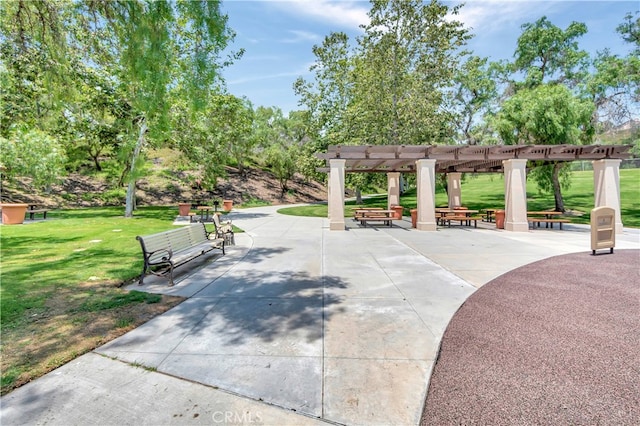 6 Camino Celeste, San Clemente, CA 92673 - view of home's community featuring a pergola, a yard, and a patio area