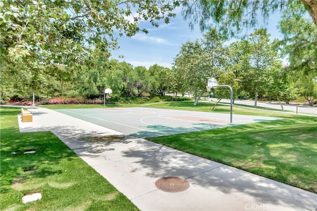 6 Camino Celeste, San Clemente, CA 92673 - view of sport court with community basketball court, a lawn, and view of wooded area