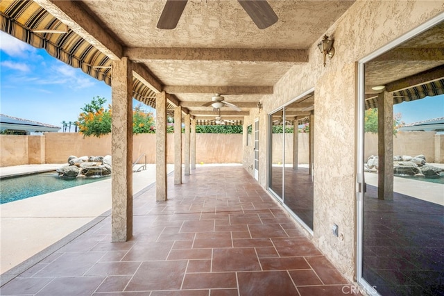 75406 Montecito Dr, Indian Wells, CA 92210 - fenced backyard featuring a ceiling fan and a patio area