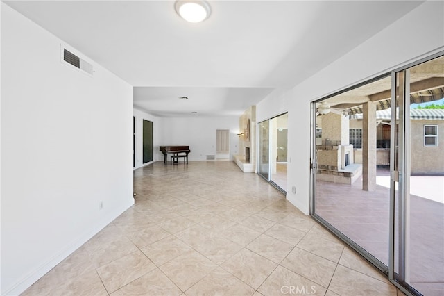 75406 Montecito Dr, Indian Wells, CA 92210 - corridor featuring light tile patterned floors and baseboards