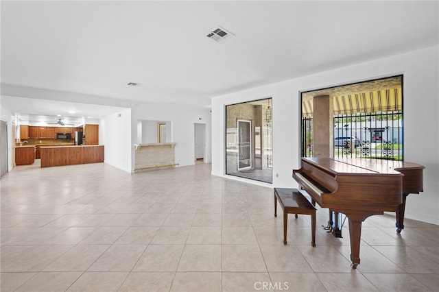 75406 Montecito Dr, Indian Wells, CA 92210 - living room featuring light tile patterned floors and ceiling fan