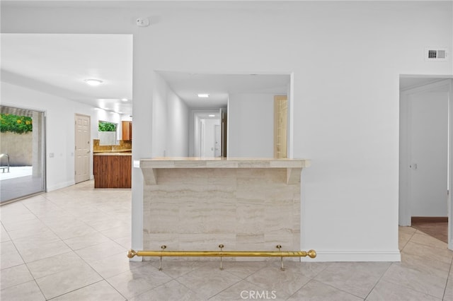 75406 Montecito Dr, Indian Wells, CA 92210 - unfurnished living room with light tile patterned floors and baseboards