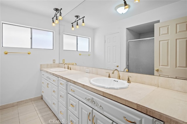 75406 Montecito Dr, Indian Wells, CA 92210 - full bathroom featuring double vanity, a shower stall, and tile patterned floors