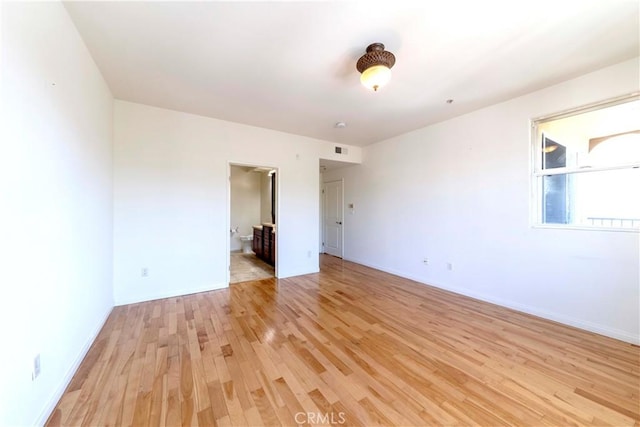 4568 W 1st St Unit 203, Los Angeles, CA 90004 - spare room with light wood-style flooring and baseboards