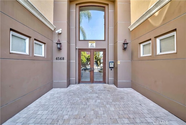 4568 W 1st St Unit 203, Los Angeles, CA 90004 - entrance to property with french doors and stucco siding