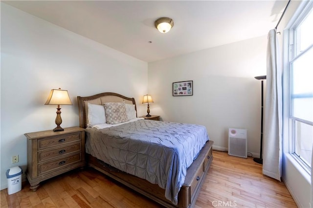 4568 W 1st St Unit 203, Los Angeles, CA 90004 - bedroom featuring light wood-type flooring and baseboards