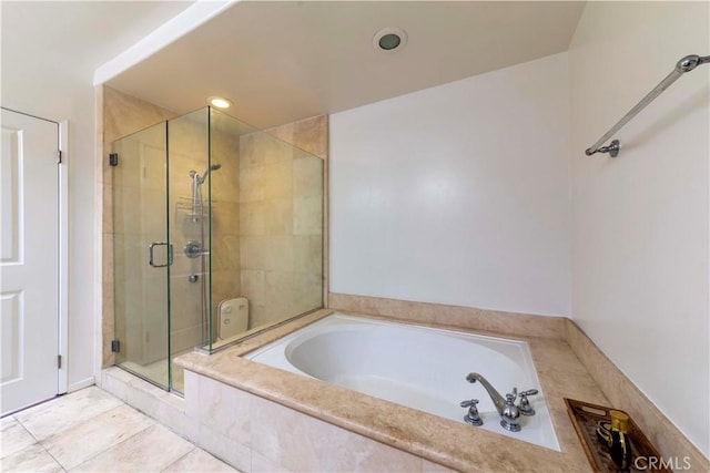 4568 W 1st St Unit 203, Los Angeles, CA 90004 - full bathroom with a stall shower, a garden tub, recessed lighting, and tile patterned floors