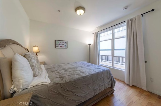 4568 W 1st St Unit 203, Los Angeles, CA 90004 - bedroom featuring light wood-style flooring and baseboards