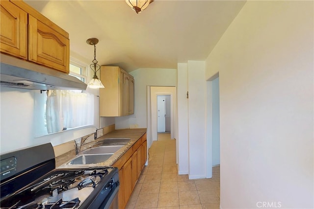 2372 W 29th Pl, Los Angeles, CA 90018 - kitchen with gas range oven, under cabinet range hood, light tile patterned flooring, decorative light fixtures, and lofted ceiling