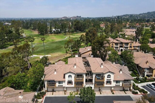2960 Champion Way Unit 1006, Tustin, CA 92782 - aerial view of residential area featuring a golf course and a tree filled landscape