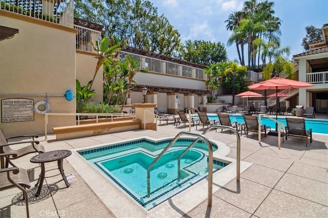 2960 Champion Way Unit 1006, Tustin, CA 92782 - community pool with a hot tub and a patio area