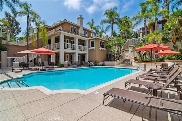 2960 Champion Way Unit 1006, Tustin, CA 92782 - community pool with a patio and stairs