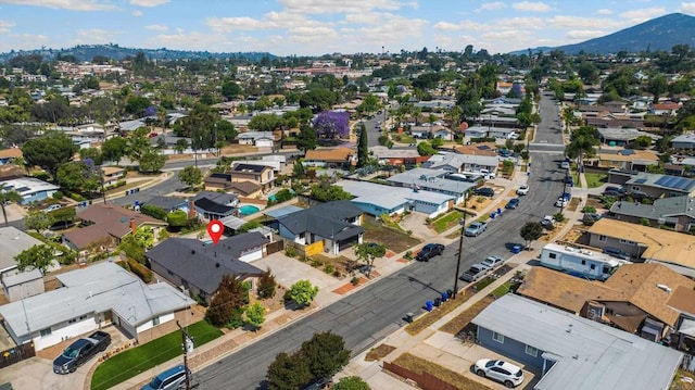 5530 Heidi St, La Mesa, CA 91942 - aerial overview of property's location with nearby suburban area and a mountainous background