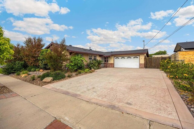 5530 Heidi St, La Mesa, CA 91942 - view of front of house featuring a garage and driveway