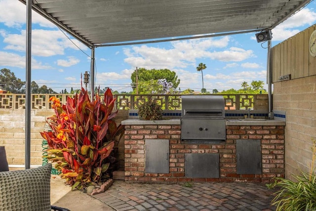 5530 Heidi St, La Mesa, CA 91942 - view of patio with exterior kitchen and a sink