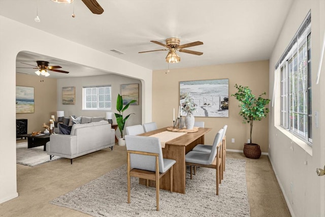5530 Heidi St, La Mesa, CA 91942 - carpeted dining space with a ceiling fan and a fireplace