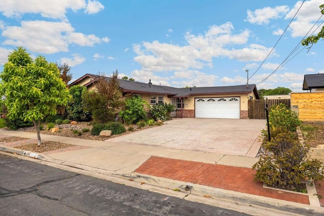 5530 Heidi St, La Mesa, CA 91942 - view of front of home with driveway, a garage, and stucco siding
