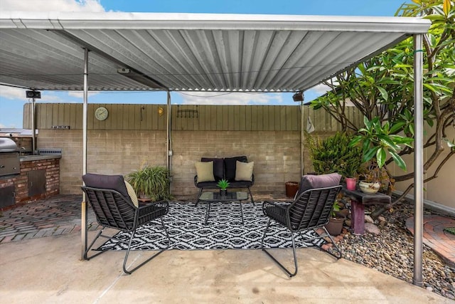 5530 Heidi St, La Mesa, CA 91942 - view of patio featuring an outdoor living space and an outdoor kitchen