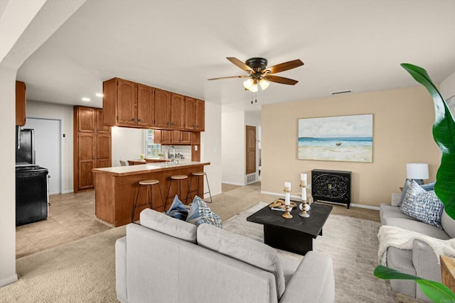 5530 Heidi St, La Mesa, CA 91942 - living room with ceiling fan, recessed lighting, and light carpet