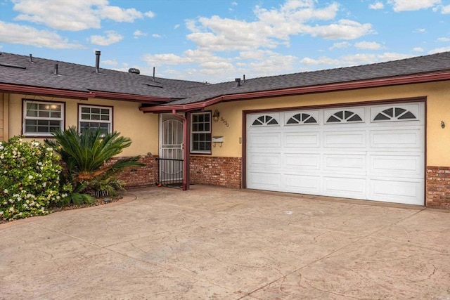 5530 Heidi St, La Mesa, CA 91942 - ranch-style home with driveway, stucco siding, brick siding, and a garage