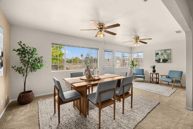 5530 Heidi St, La Mesa, CA 91942 - dining space with plenty of natural light, light colored carpet, and ceiling fan