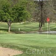 30717 Seminole Dr, Coarsegold, CA 93614 - view of community with golf course view and a lawn